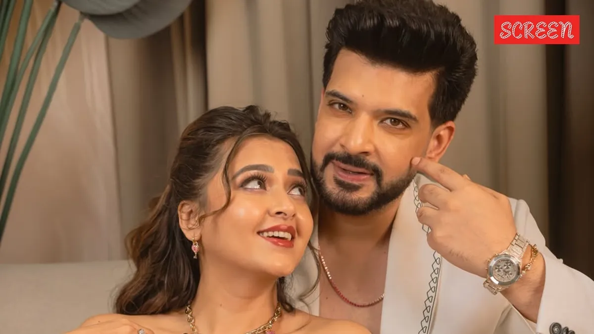 Tejasswi Prakash and Karan Kundrra posing together.