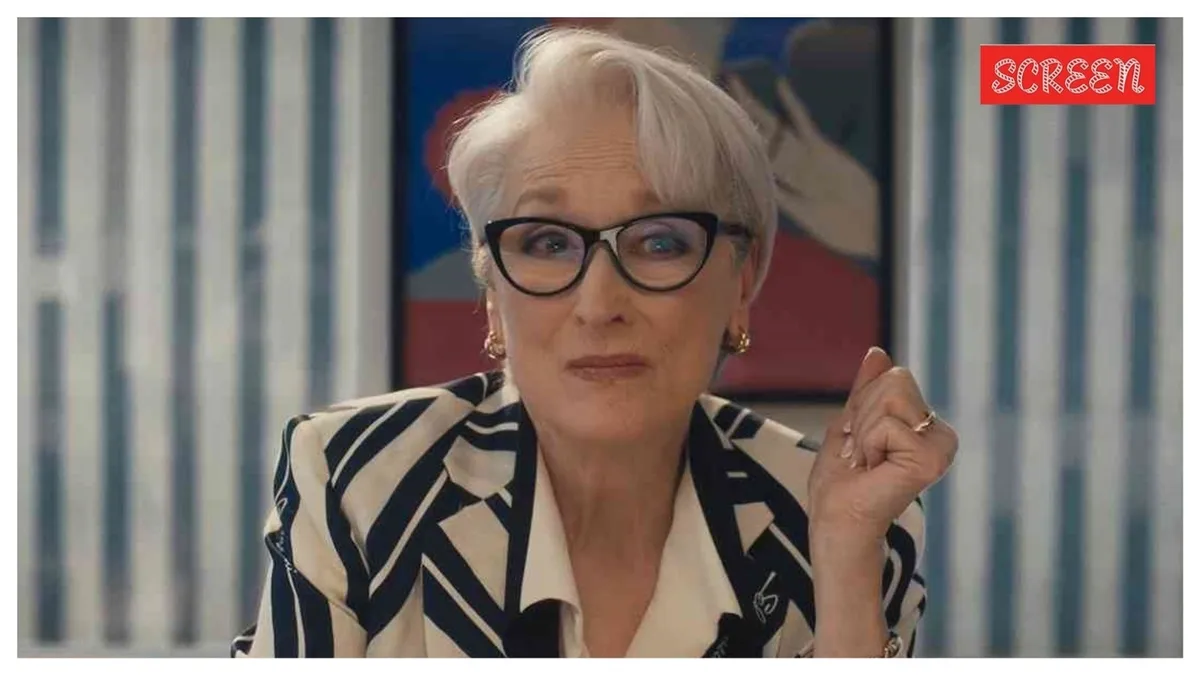 Miranda Priestly and Andy Sachs from The Devil Wears Prada 2, looking stylish in a fashion office.