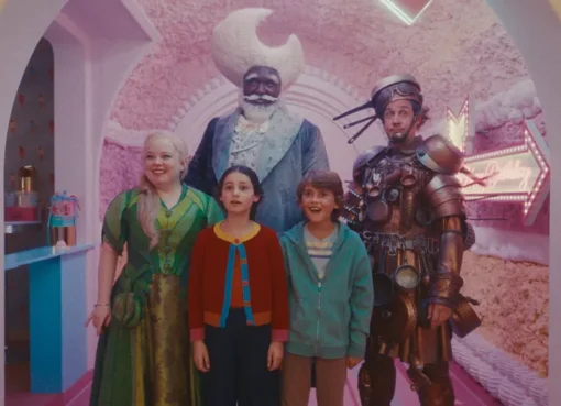 A still from The Magic Faraway Tree movie showing children looking up at a magical treehouse.