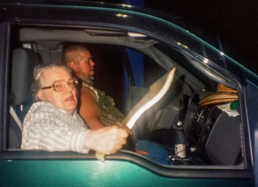 Still from 'The Python Hunt' documentary showing a tense python hunt scene.