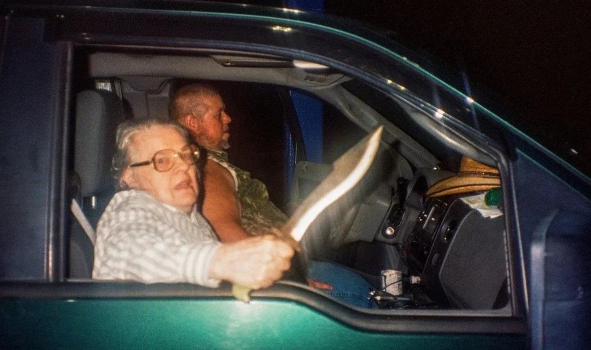 Still from 'The Python Hunt' documentary showing a tense python hunt scene.