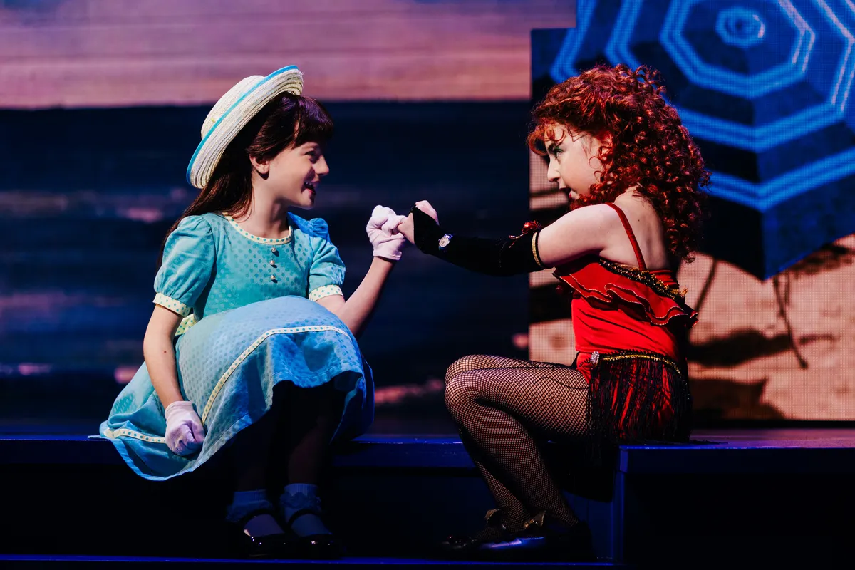 Jessica Vosk and Kelli Barrett performing on stage in the musical Beaches.