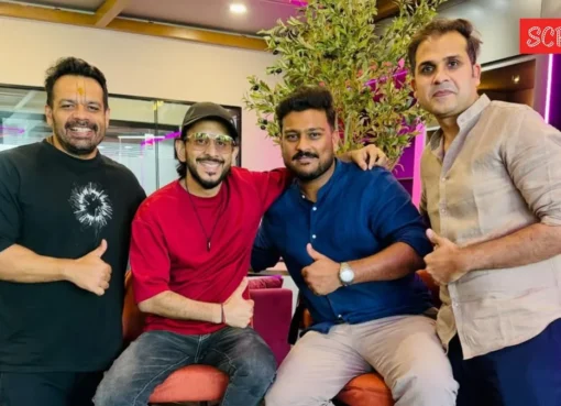 Aman Gupta smiling next to Flying Beast founders.