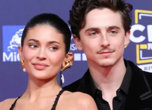 Timothée Chalamet and Kylie Jenner looking serious in a photo.