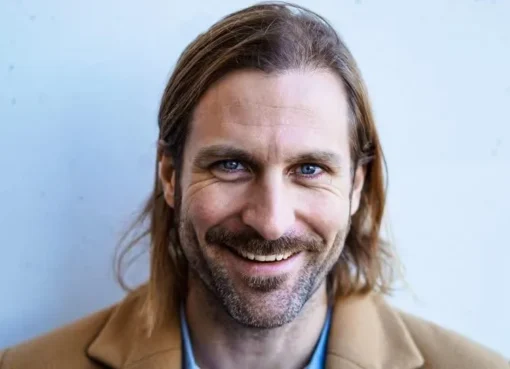 Actor Stewart McLean smiling.
