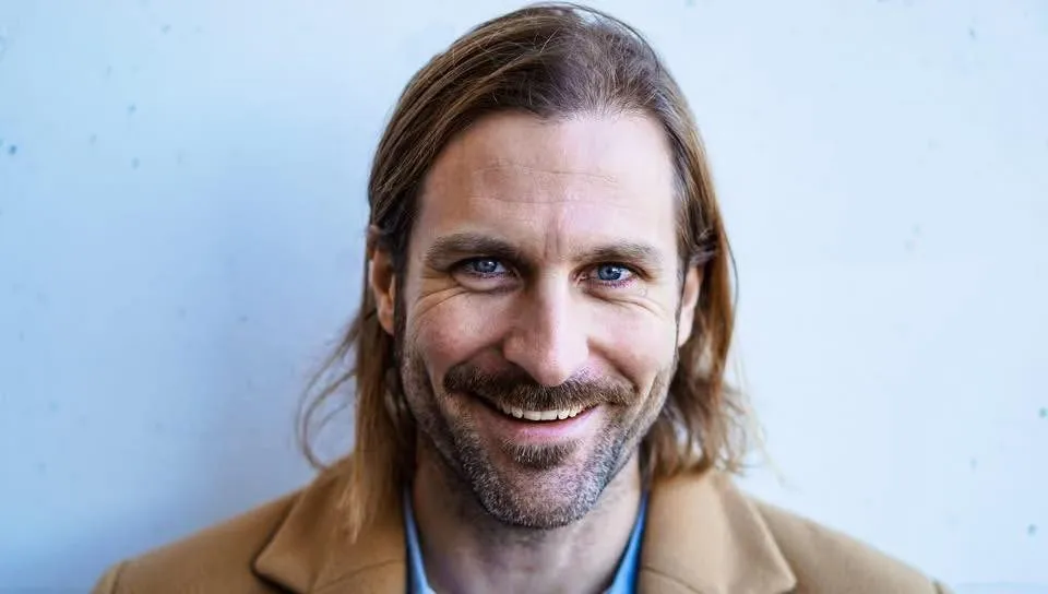 Actor Stewart McLean smiling.