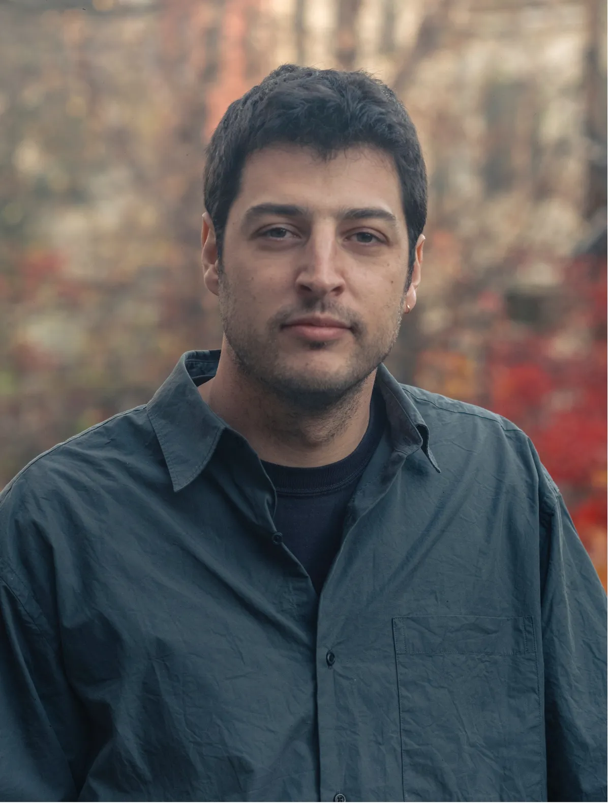 Adam Meeks, director of the acclaimed film 'Union County', smiling.