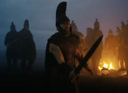 A dark and cinematic movie still from The Odyssey trailer showing a stormy sea.