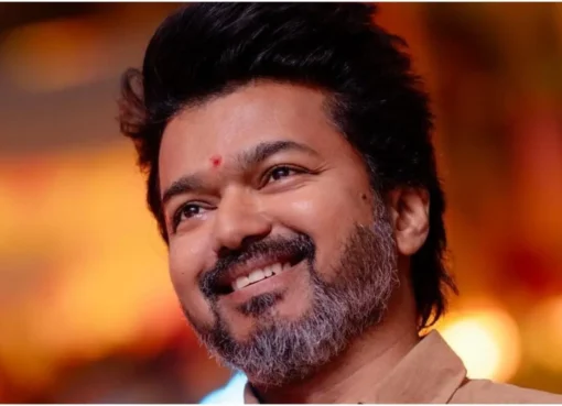 Thalapathy Vijay looking confident and smiling.