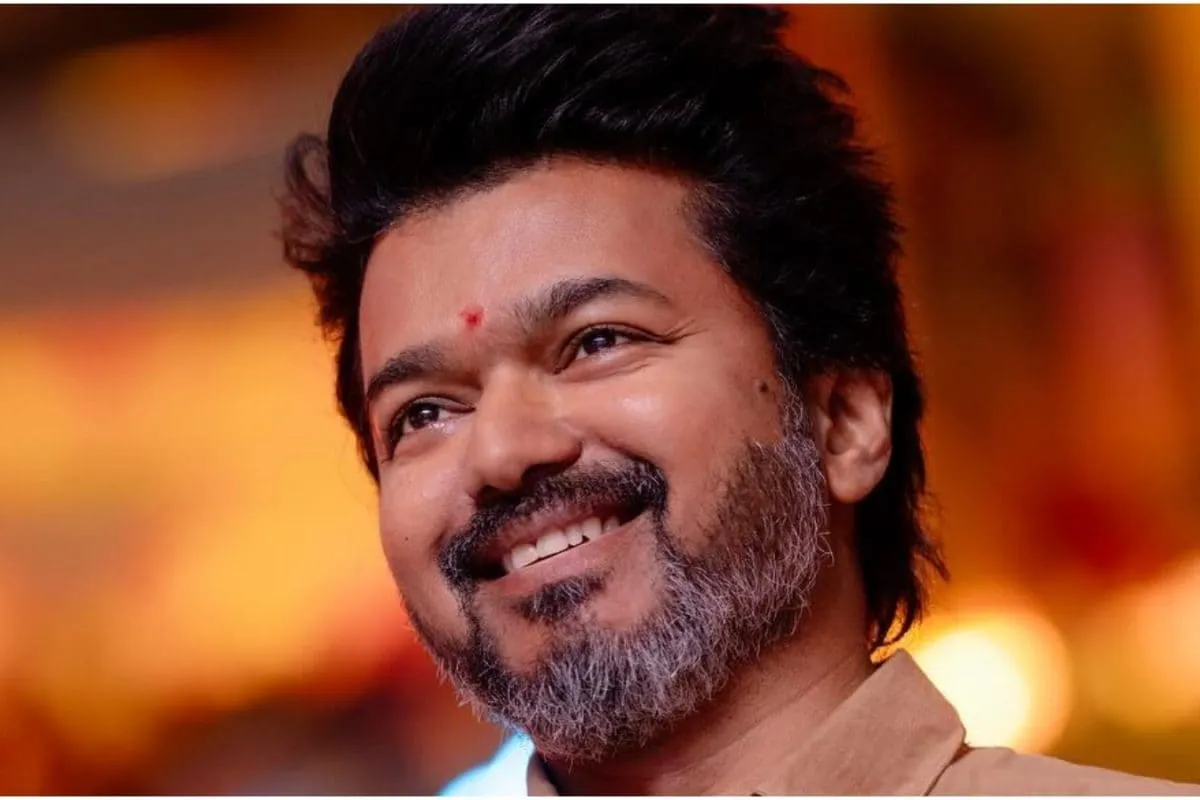 Thalapathy Vijay looking confident and smiling.