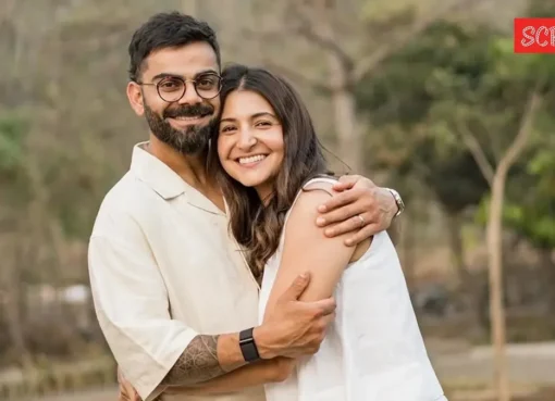 Virat Kohli and Anushka Sharma smiling together.
