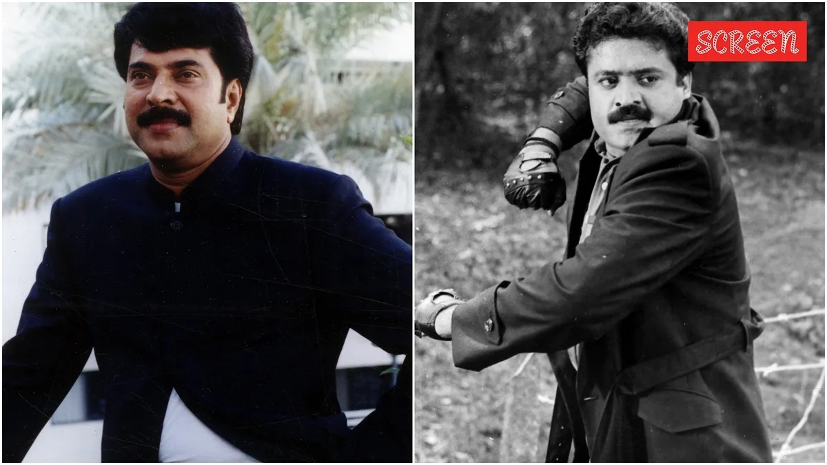Suresh Gopi smiling in a movie scene.