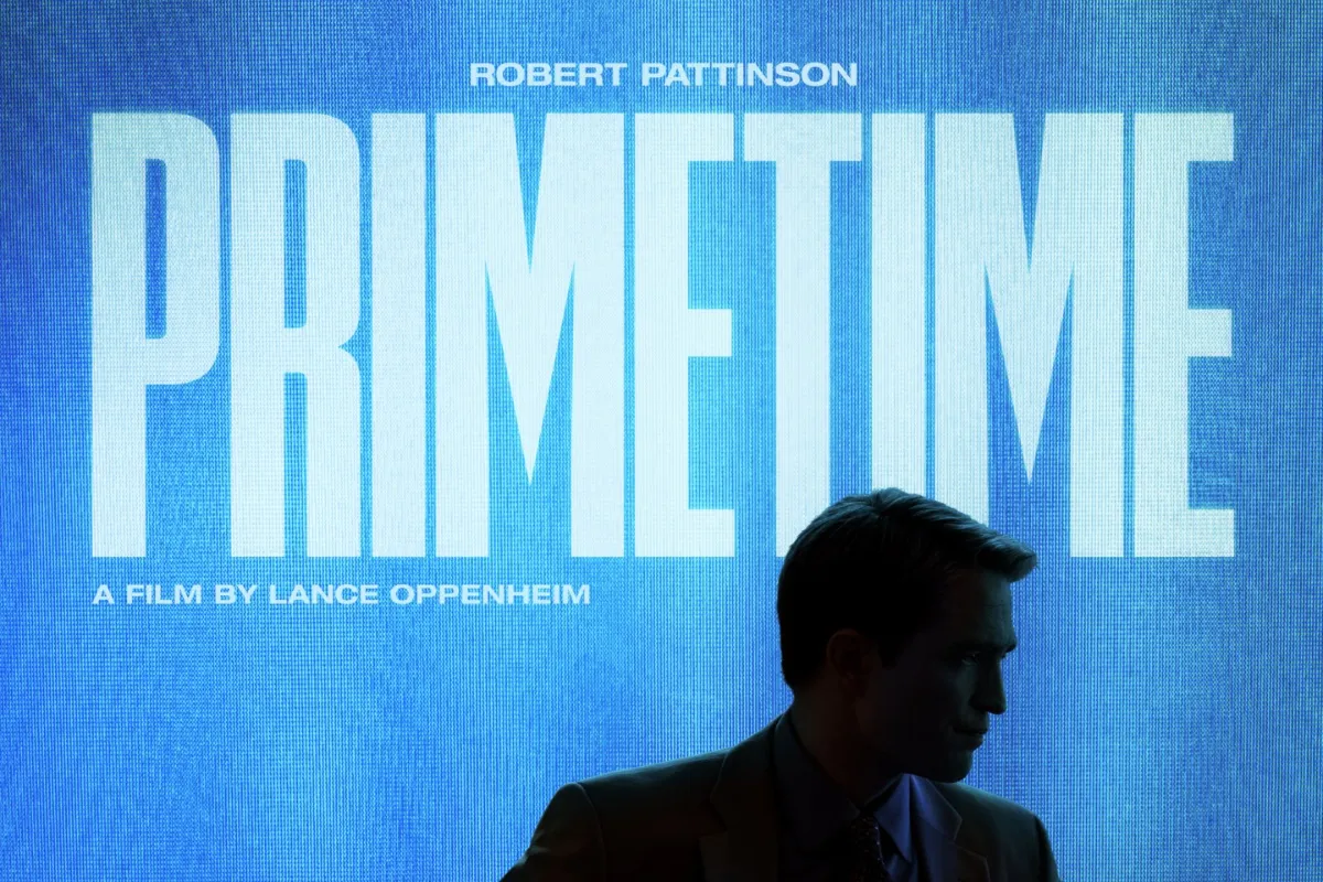 Robert Pattinson intensely portraying Chris Hansen in a still from the 'Primetime' movie trailer.