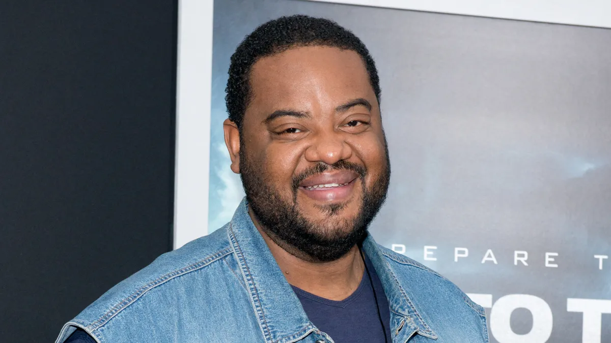 Actor Grizz Chapman smiling on the red carpet