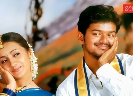 Photo of Trisha Krishnan and Vijay smiling together.