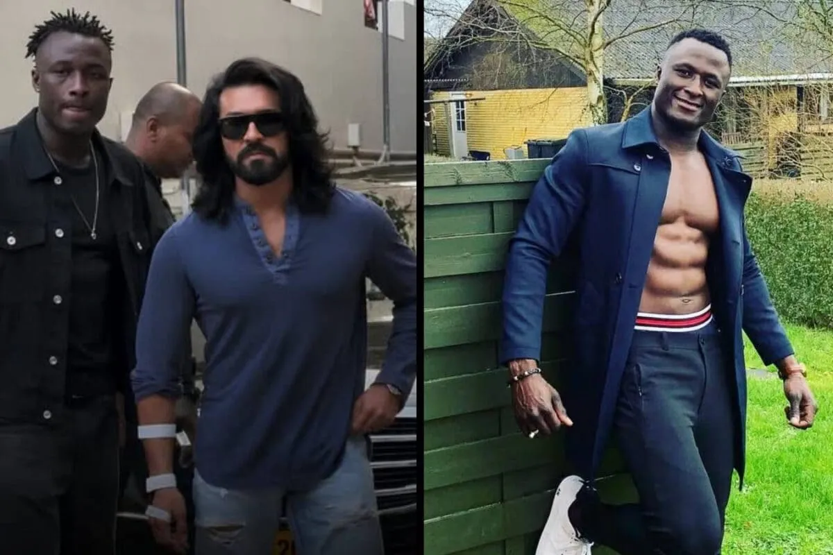 Ram Charan standing next to his tall MMA fighter bodyguard during movie promotions