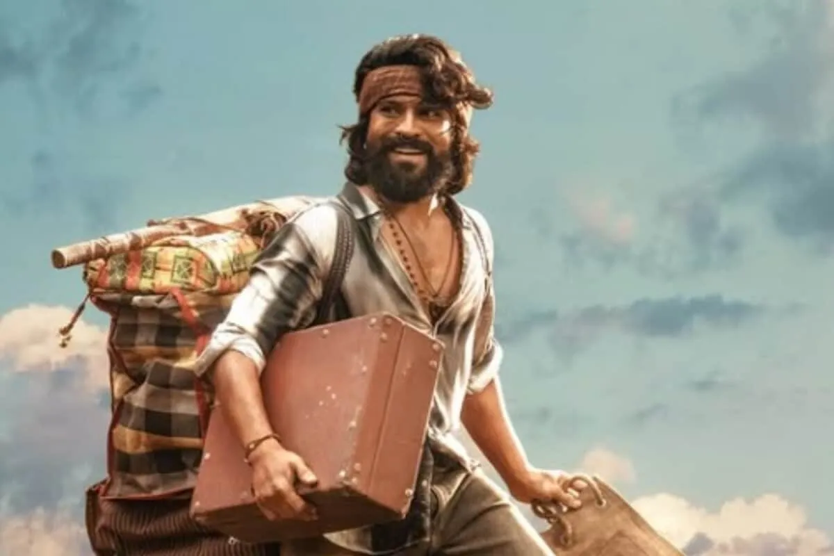 Ram Charan in a dramatic pose for the movie Peddi, perhaps in a poster or still.