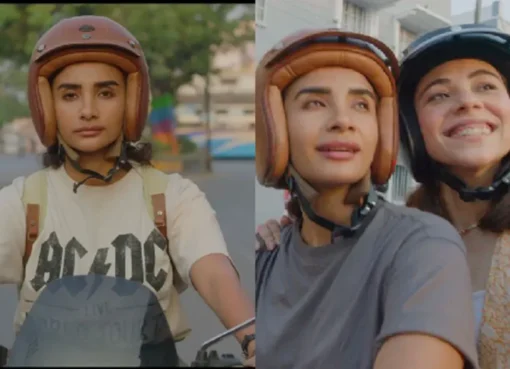 A still from the 'Sherni' song featuring the lead actresses on a road.