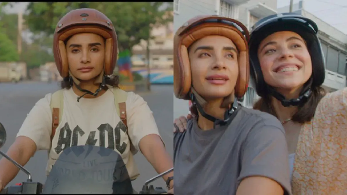 A still from the 'Sherni' song featuring the lead actresses on a road.