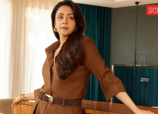 Jyotika smiling during a movie scene