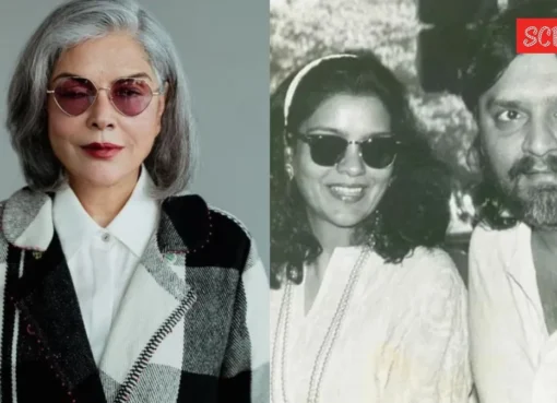 Zeenat Aman looking reflective, a soft focus capturing a moment of deep thought.