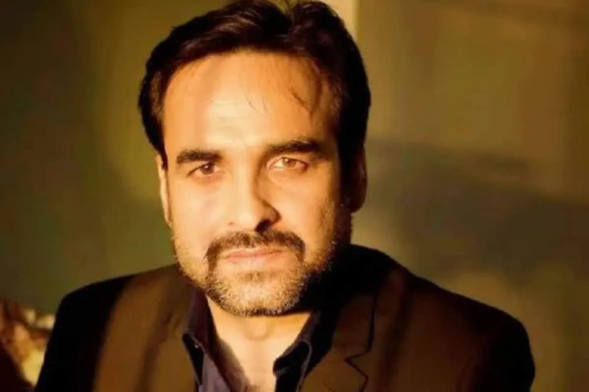 Pankaj Tripathi looking thoughtful in a simple scene