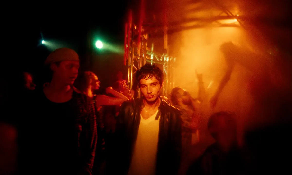 A dark and moody image representing a 90s New York City nightclub.