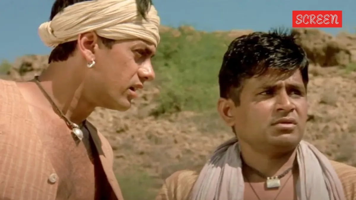 Aamir Khan dressed as Bhuvan from Lagaan, looking focused and disciplined.