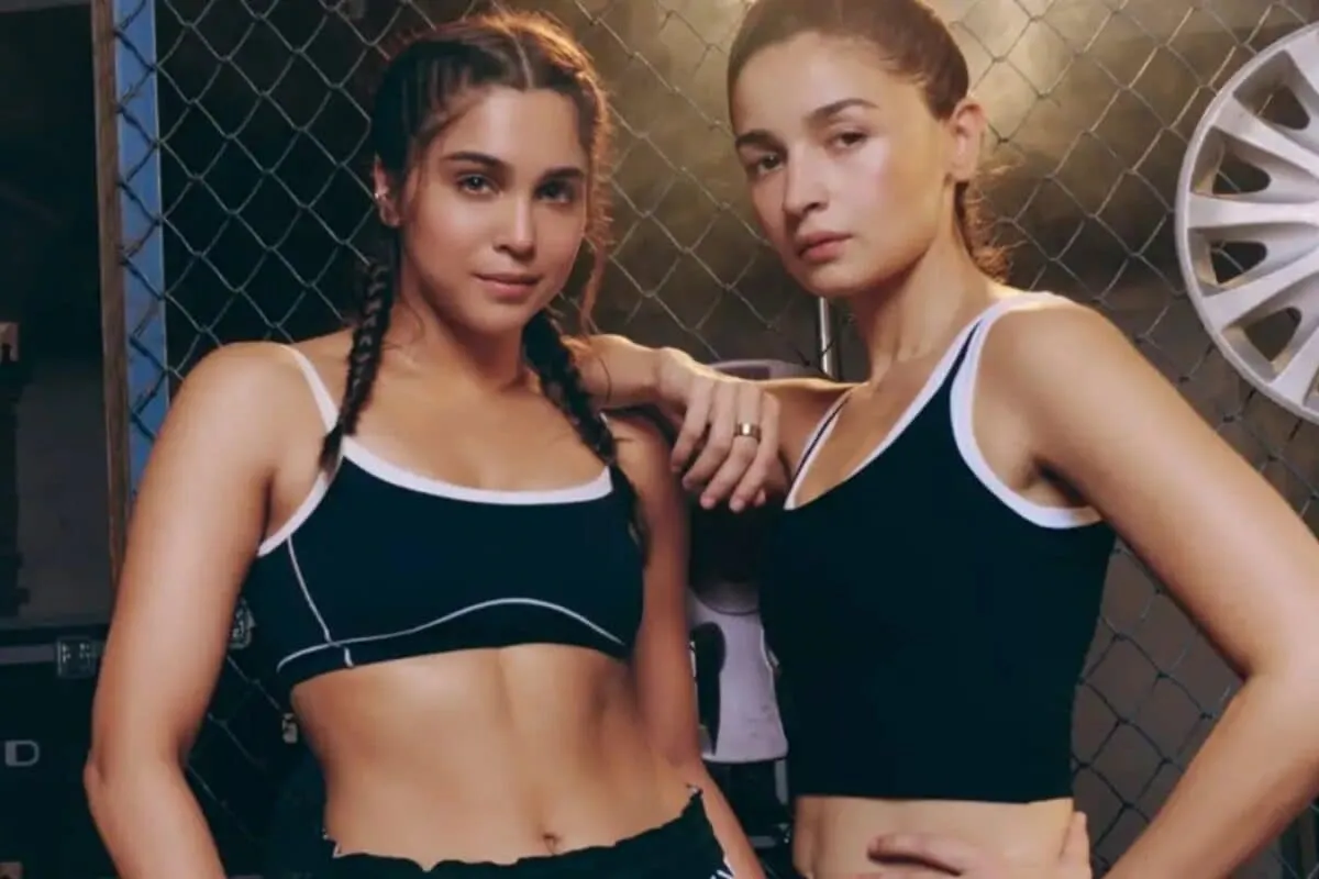 Alia Bhatt looking stylish and confident, possibly in a film promotion for 'Alpha'.