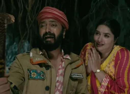 Anjali Anand and Riteish Deshmukh smiling and laughing, looking like a fun comedic duo.