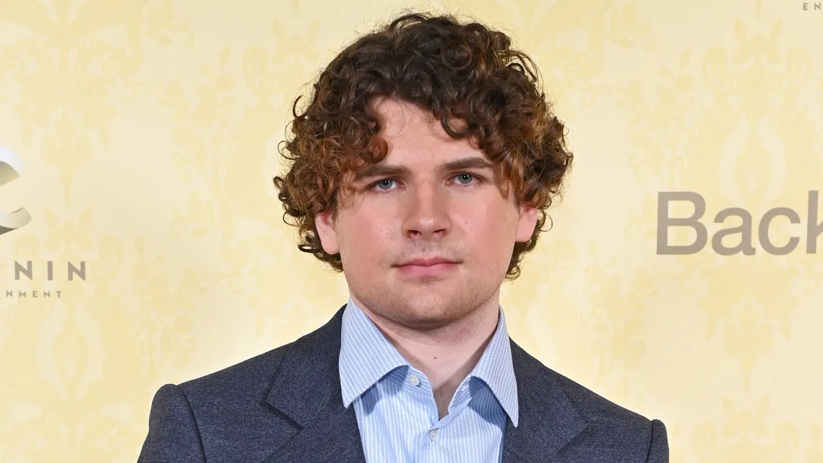 Kane Parsons at a movie event looking thoughtful