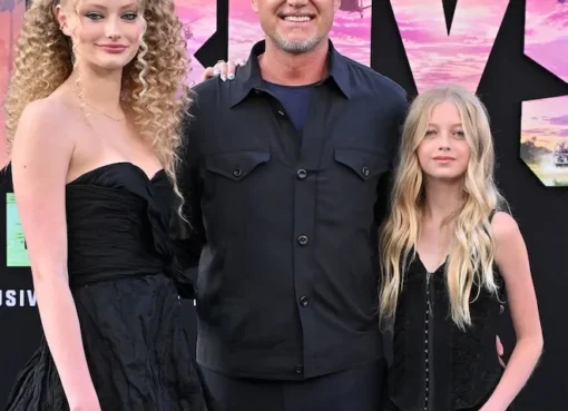 Eric Dane and Rebecca Gayheart standing proudly with their daughter Georgia at her middle school graduation.
