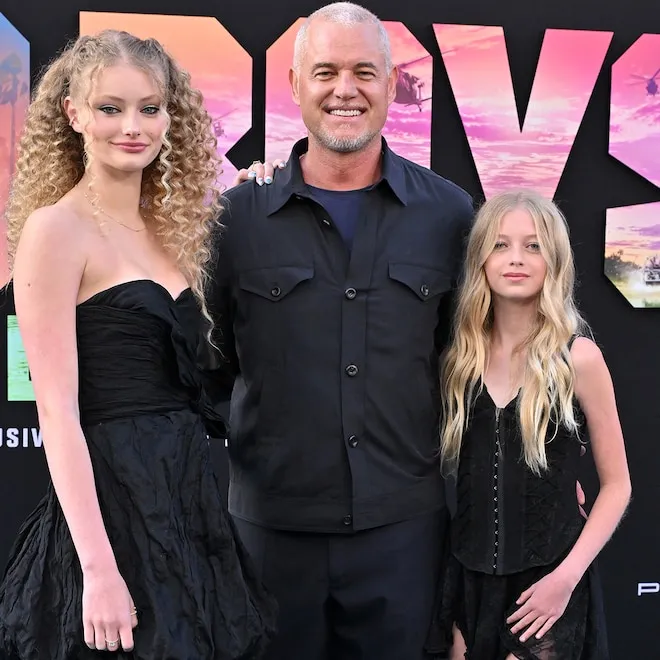 Eric Dane and Rebecca Gayheart standing proudly with their daughter Georgia at her middle school graduation.