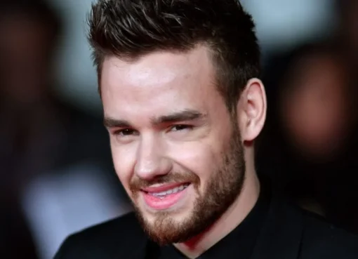 Photo of Liam Payne with his son, Bear Grey Payne, in a tender moment.
