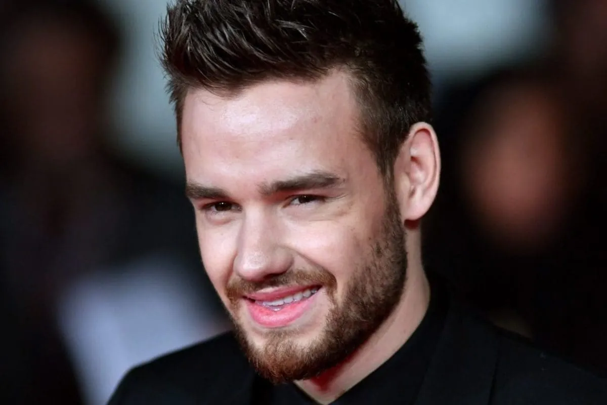 Photo of Liam Payne with his son, Bear Grey Payne, in a tender moment.