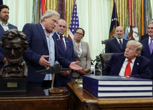 Captain Sig Hansen and Donald Trump standing together in the Oval Office.