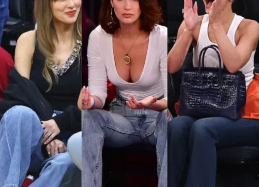 Celebrities sitting courtside at an NBA game.