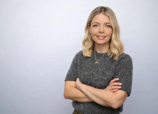 Professional headshot of Katina Grant, smiling warmly.