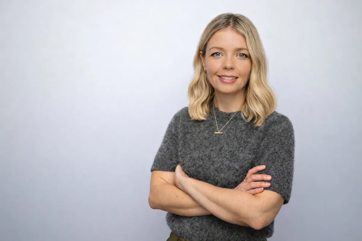 Professional headshot of Katina Grant, smiling warmly.