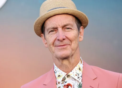 Actor Denis O'Hare smiling.