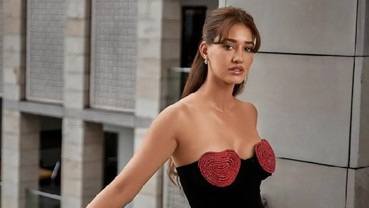 Photo of Disha Patani smiling and looking stylish.