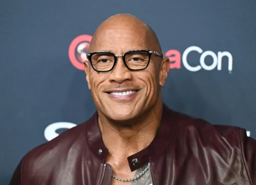 Dwayne Johnson looking serious and thoughtful on a magazine cover for Esquire.