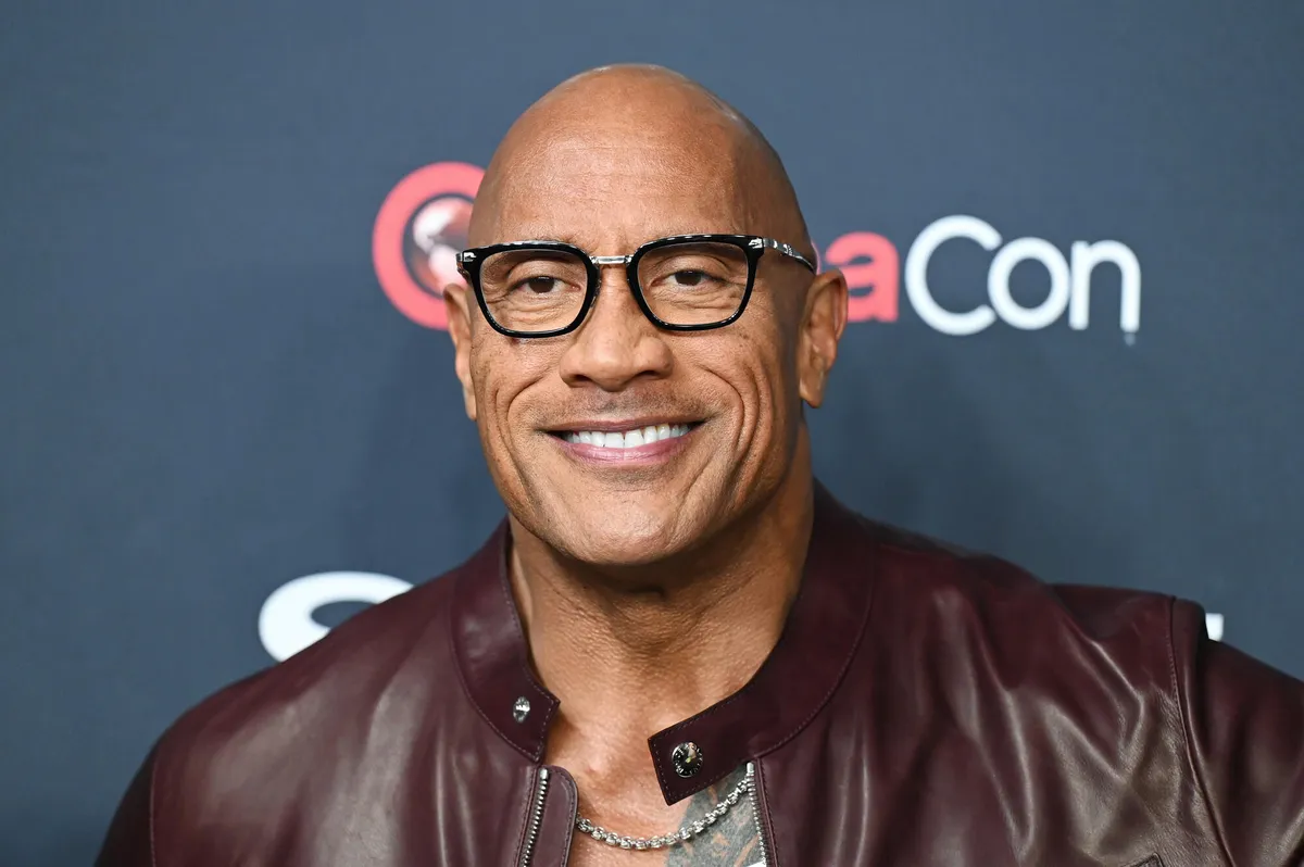 Dwayne Johnson looking serious and thoughtful on a magazine cover for Esquire.