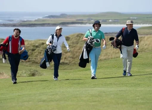 A scene from Edward Burns' movie 'Finnegan's Foursome' showing characters on a golf course.