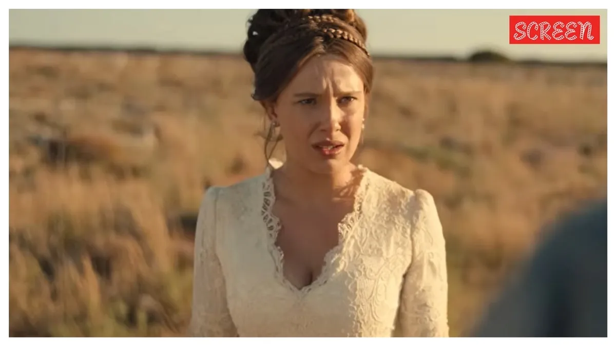 Millie Bobby Brown as Enola Holmes looking determined.
