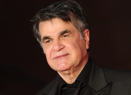 Jafar Panahi, the acclaimed filmmaker, looking serious and pensive.