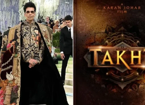 Karan Johar posing at a film event with a serious expression