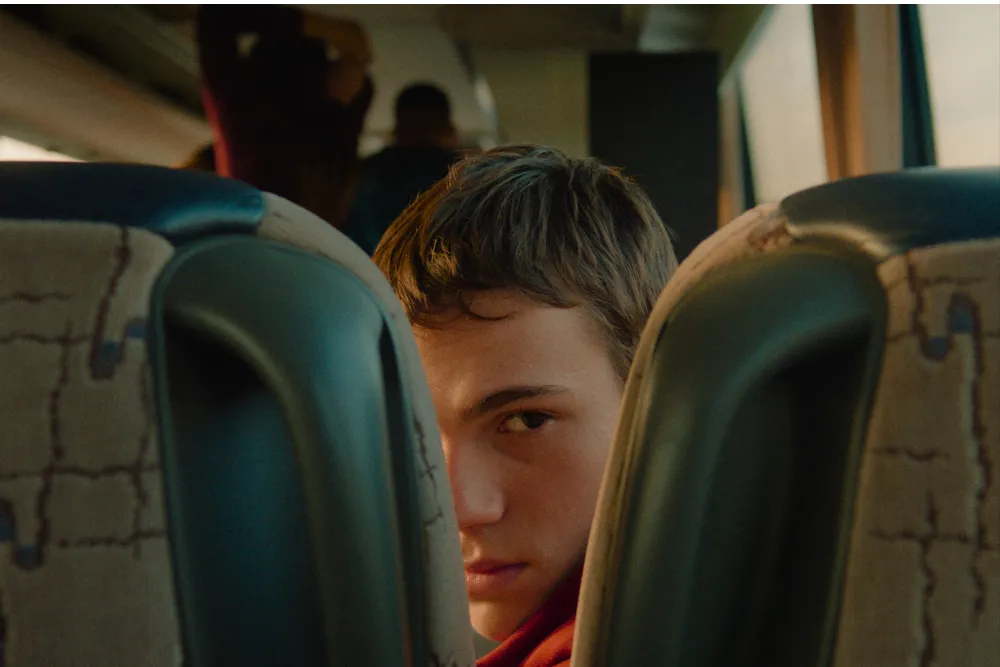 Image from the film '3 Weeks After' showing children, possibly in a difficult situation.