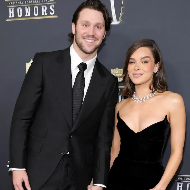 Hailee Steinfeld and Josh Allen smiling together, looking happy and relaxed.