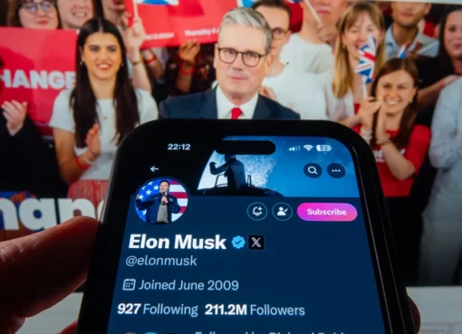 A smartphone screen with popular social media app icons, overlaid with a red 'no entry' symbol, illustrating a ban for under-16s.